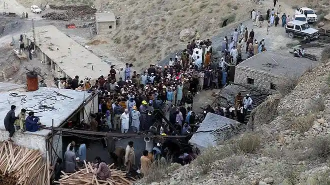 People gather near a coal mine after a deadly explosion buried parts of the mining complex on the outskirts of Quetta, Pakistan, on July 30, 2026.