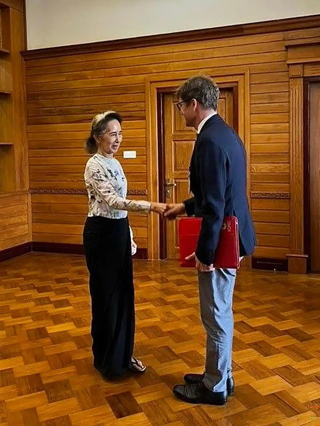 Detained former Myanmar civilian leader Aung San Suu Kyi meets Arnaude de Baecque, the International Committee of the Red Cross (ICRC) resident representative to Myanmar, in Naypyidaw on August 3, 2026