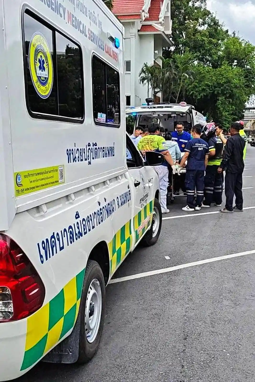 Rescue workers perform CPR on Nonthaburi Provincial Administrative Organization president Thongchai Yenprasert after he was shot in Nonthaburi, Thailand.